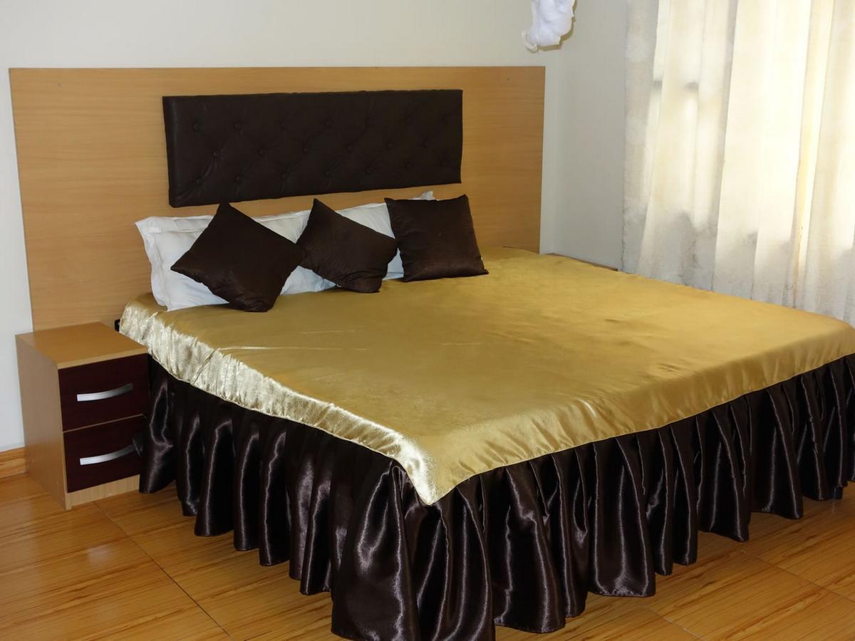 Bridgeway Guest House Джинджа Экстерьер фото